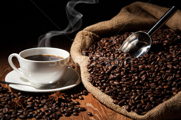 Foto d'archivio: Caffè · ancora · vita · Cup · chicchi · di · caffè · bag · tavolo · in · legno