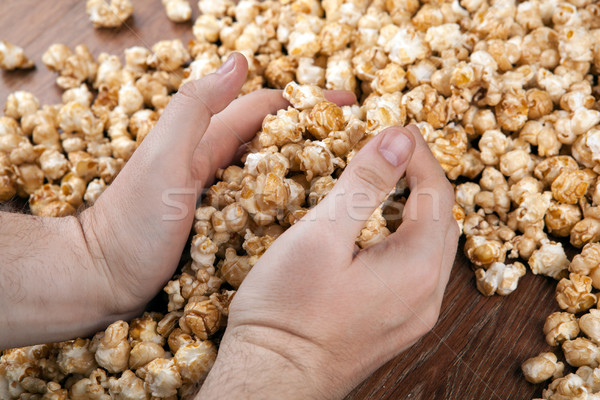people gaining a bunch of popcorn Stock photo © mizar_21984