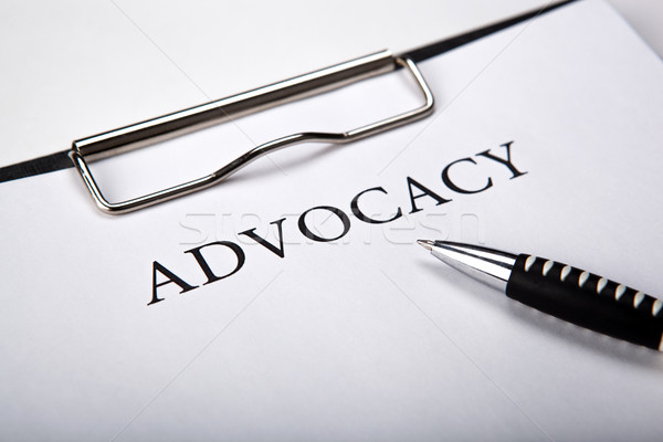 Stock photo: document with the title of advocacy and pen