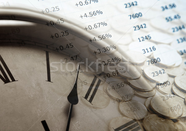 pile of coins with digits and clock face Stock photo © mizar_21984