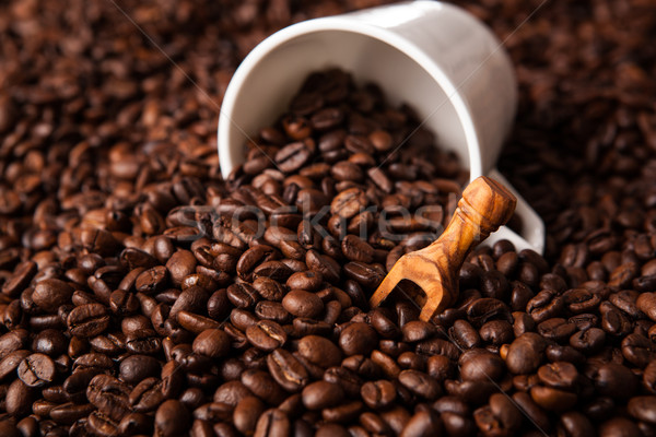 Stock photo: inverted cup with coffee beans