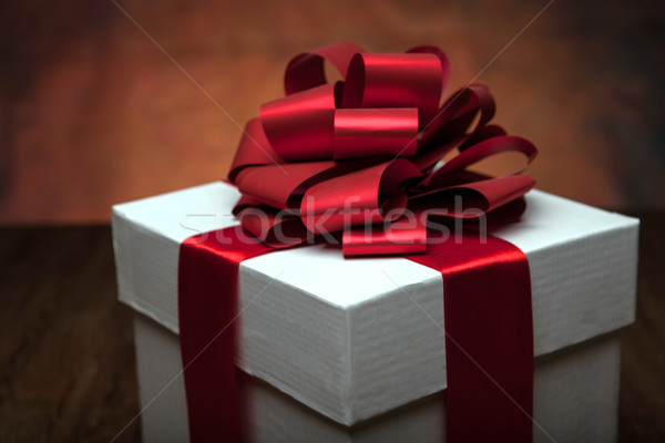 one large white gift box on the wood table Stock photo © mizar_21984