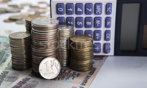 Stock photo: stacks of Russian rubles with calculator