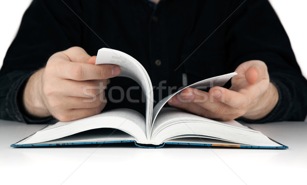 men's hands flipping through the pages of the book Stock photo © mizar_21984