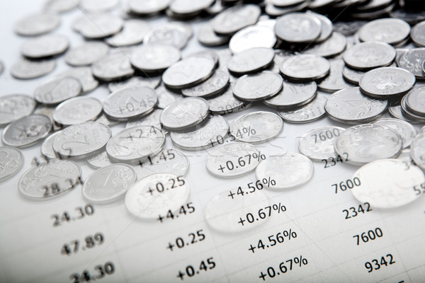 Stock photo: pile of coins and counting