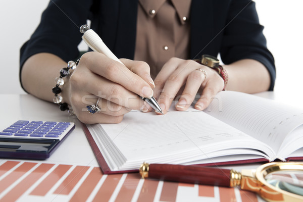 woman calculates future plans Stock photo © mizar_21984