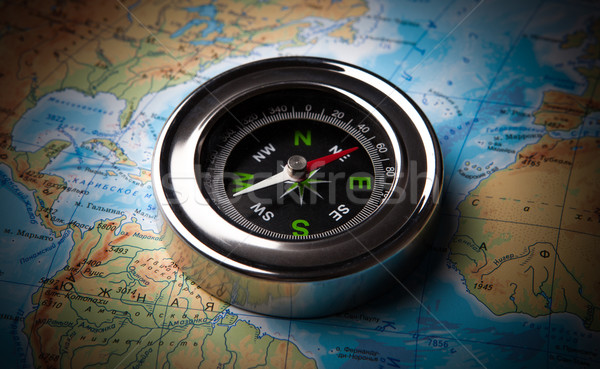 tourist compass lying on a map Stock photo © mizar_21984