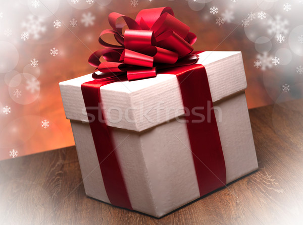 Stock photo: one large white gift box on the wood table