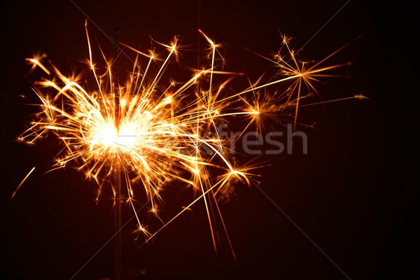 бенгальский огонь sparks вечеринка огня темно фейерверк Сток-фото © mobi68