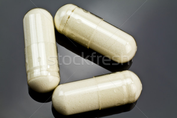 Stock photo: 3 little pills
