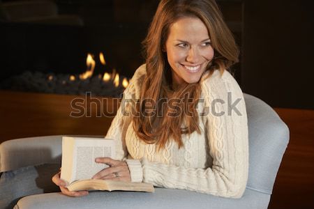 Woman Enjoying Meal Whilst Watching TV Stock photo © monkey_business