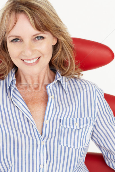 Mid age businesswoman relaxing in chair Stock photo © monkey_business