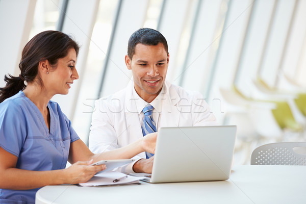 Doctor And Nurse Having Informal Meeting In Hospital Canteen Stock photo © monkey_business