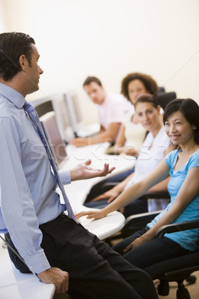 Man giving lecture in computer class Stock photo © monkey_business