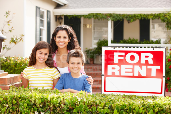 Mother and children outside home for rent Stock photo © monkey_business
