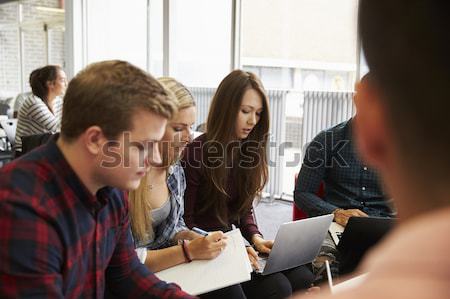 Female Pupil Studying At Desk In Classroom Stock photo © monkey_business