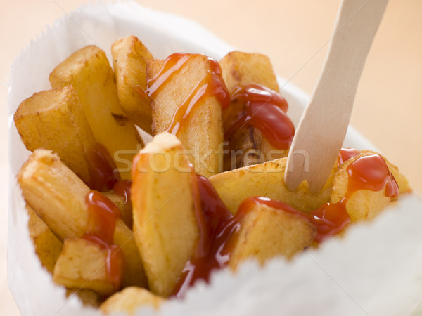 Chip Shop Chips in a Bag with a Wooden Fork and Tomato ketchup Stock photo © monkey_business