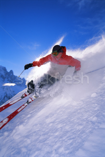 Jonge man skiën man vakantie vakantie kleur Stockfoto © monkey_business
