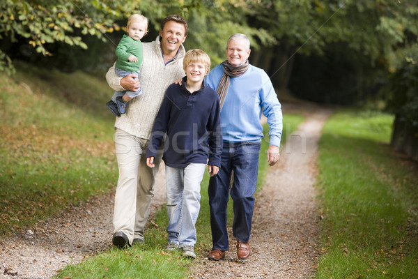 Grandfather walking with son and grandson Stock photo © monkey_business