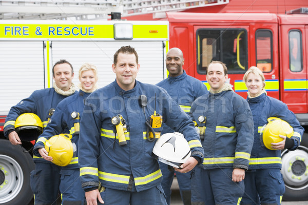 Portrait of a group of firefighters by a fire engine Stock photo © monkey_business