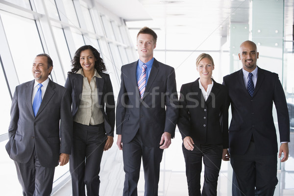 Group of business people walking towards camera Stock photo © monkey_business