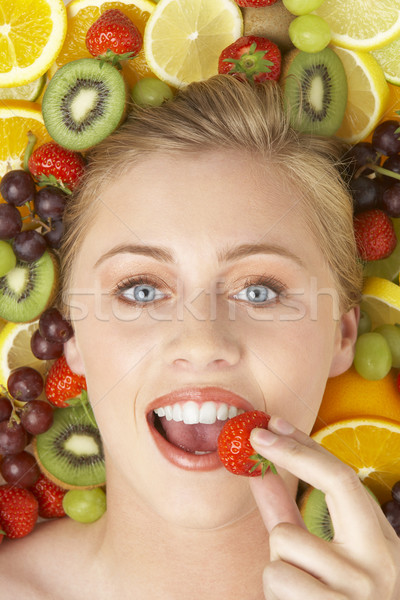 Portrait Of Young Woman Eating Strawberry Stock photo © monkey_business