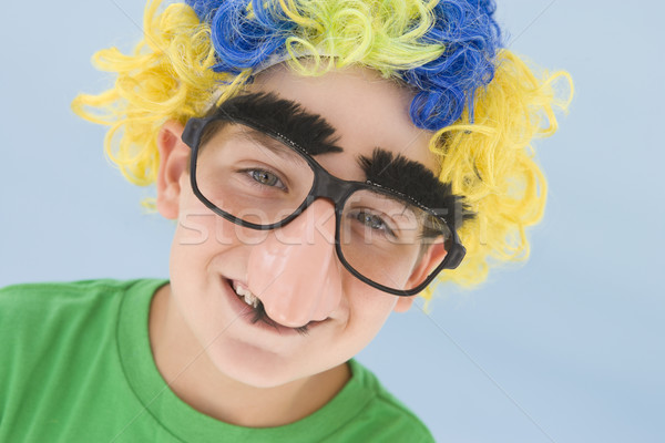 Młody chłopak clown peruka podróbka nosa Zdjęcia stock © monkey_business