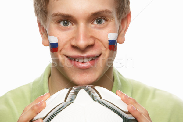 Stock photo: Young Male Football Fan With Slovakian Flag Painted On Face