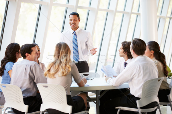 Business People Having Board Meeting In Modern Office Stock photo © monkey_business