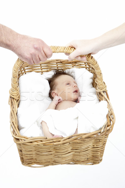 Newborn Baby Held In Basket By Parents Stock photo © monkey_business