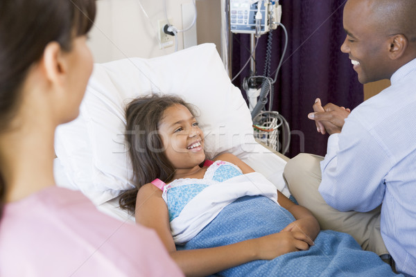 Doctor And Nurse Checking Up On Girl In Hospital Stock photo © monkey_business