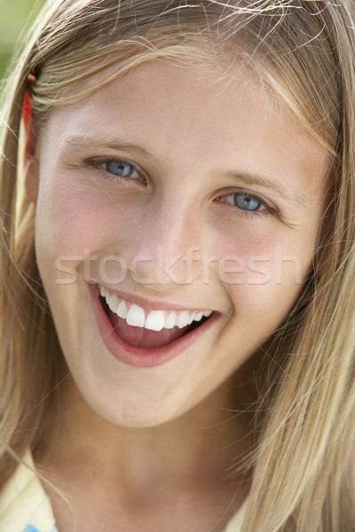 Stock photo: Portrait Of Girl Smiling