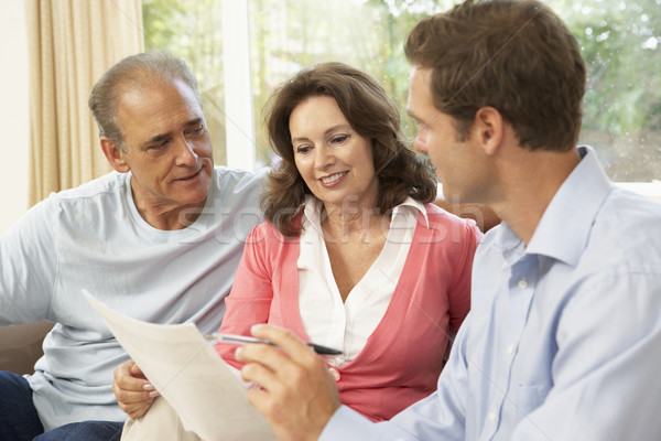 Senior Couple With Financial Advisor At Home Stock photo © monkey_business