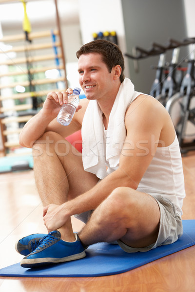 Man Resting After Exercises In Gym Stock photo © monkey_business