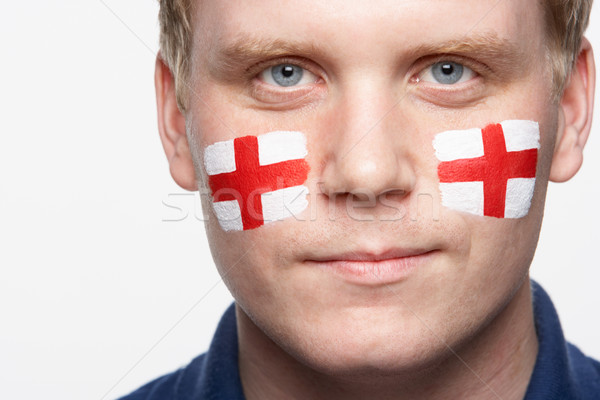 Young Male Sports Fan With St Georges Flag Painted On Face Stock photo © monkey_business