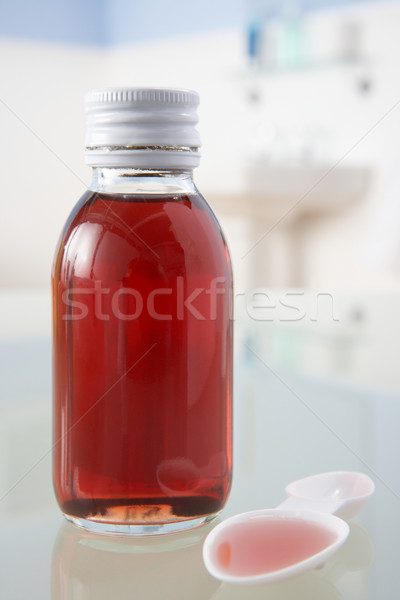 Stock photo: Cough medicine on bathroom shelf