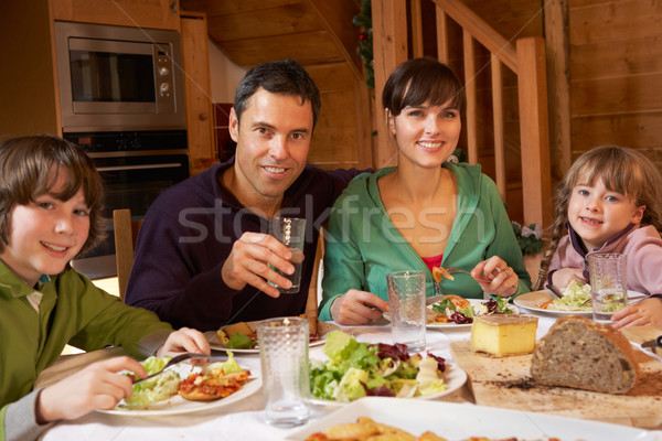 Family Enjoying Meal In Alpine Chalet Together Stock photo © monkey_business