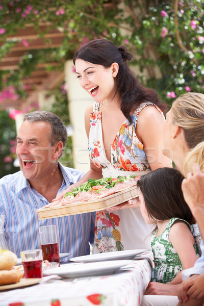 Woman Serving At Multi Generation Family Meal Stock photo © monkey_business