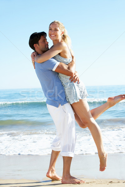 Couple Enjoying Romantic Beach Holiday Stock photo © monkey_business