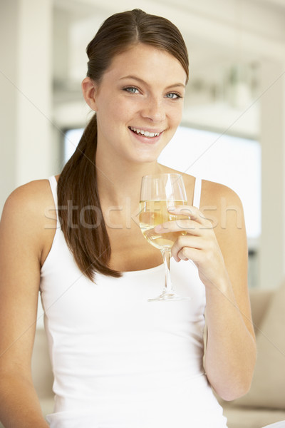 Mulher jovem vidro vinho branco mulher vinho Foto stock © monkey_business