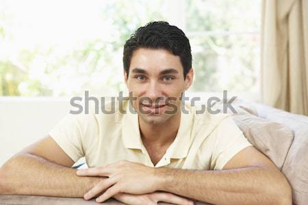 A Middle Eastern man lying on a bed Stock photo © monkey_business