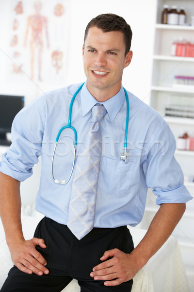 Young male doctor in consulting room Stock photo © monkey_business