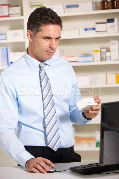 UK pharmacist working on computer Stock photo © monkey_business