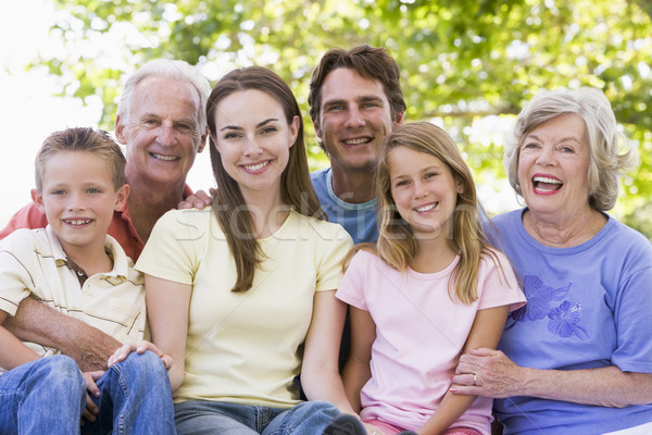 Extended family outdoors smiling Stock photo © monkey_business