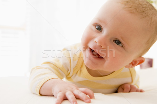 Baba ágy fiú mosolyog megnyugtató aranyos Stock fotó © monkey_business