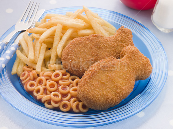 Fish Cakes with Spaghetti Hoops and Chips Stock photo © monkey_business