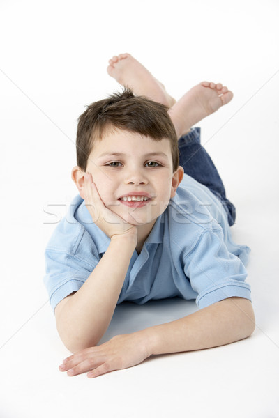 Young Boy Lying On Stomach In Studio Stock photo © monkey_business