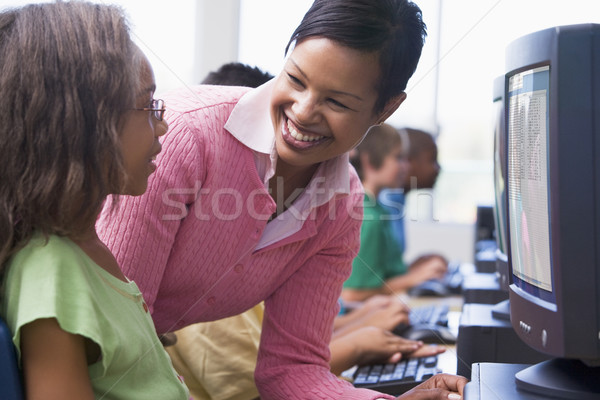 Bilgisayar sınıf öğretmen kız çocuklar Stok fotoğraf © monkey_business