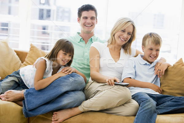 Famille séance salon télécommande souriant fille [[stock_photo]] © monkey_business