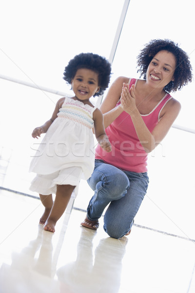 Anya lánygyermek bent játszik mosolyog baba Stock fotó © monkey_business